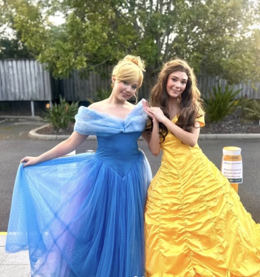 Indigo and Bridget, founders of Polished Parties, in costume at a party