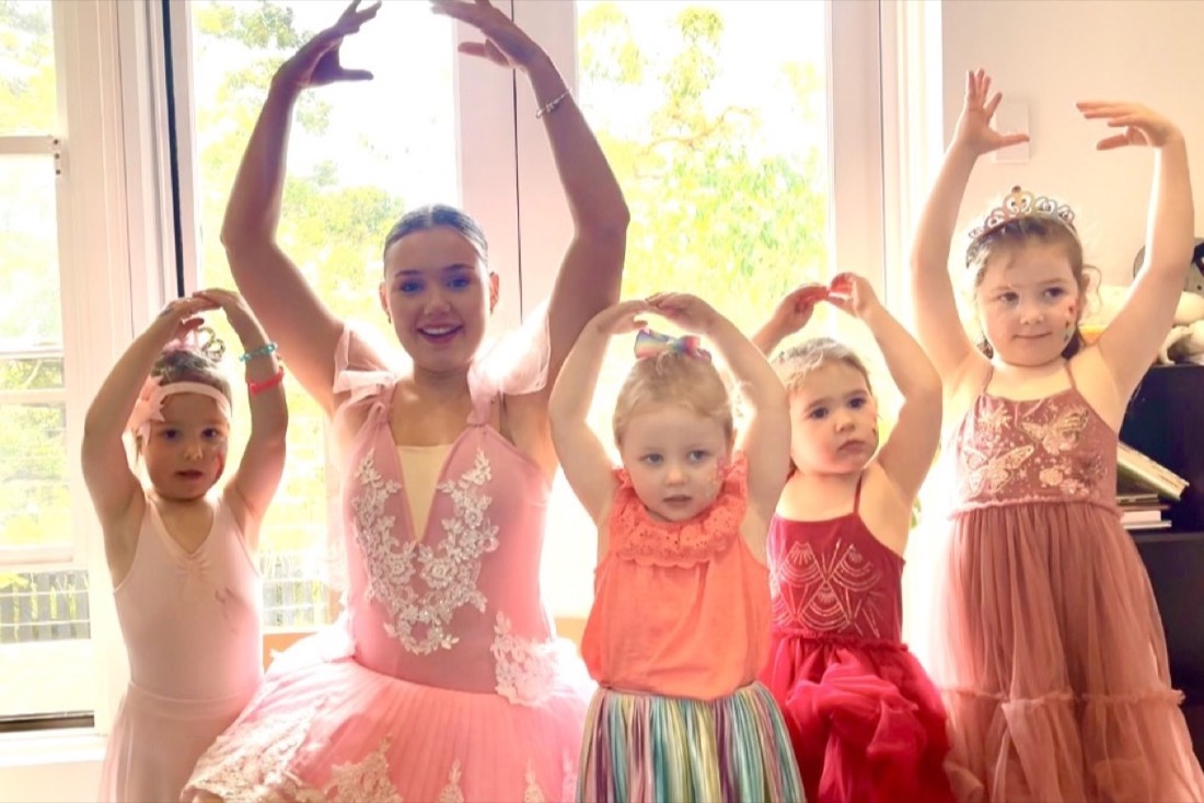A Polished Parties ballerina teaching a mini dance class to children at a party